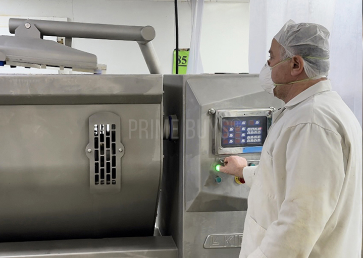 Prime Buys production operator monitoring processing equipment
